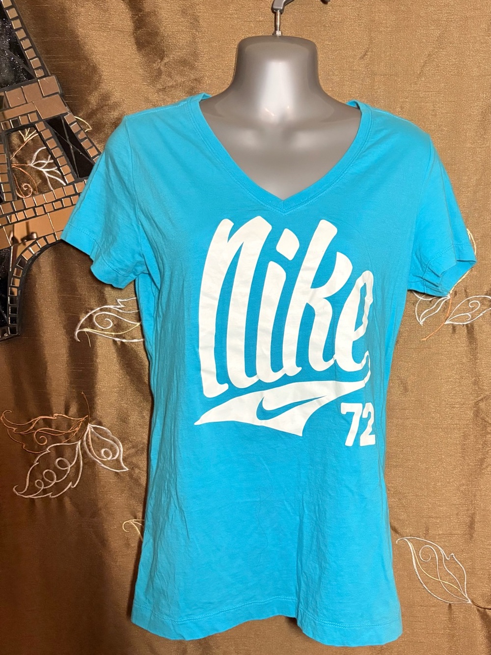 Nike Woman’s Aqua Blue V-Neck Tee with White Logo and '72 Accent